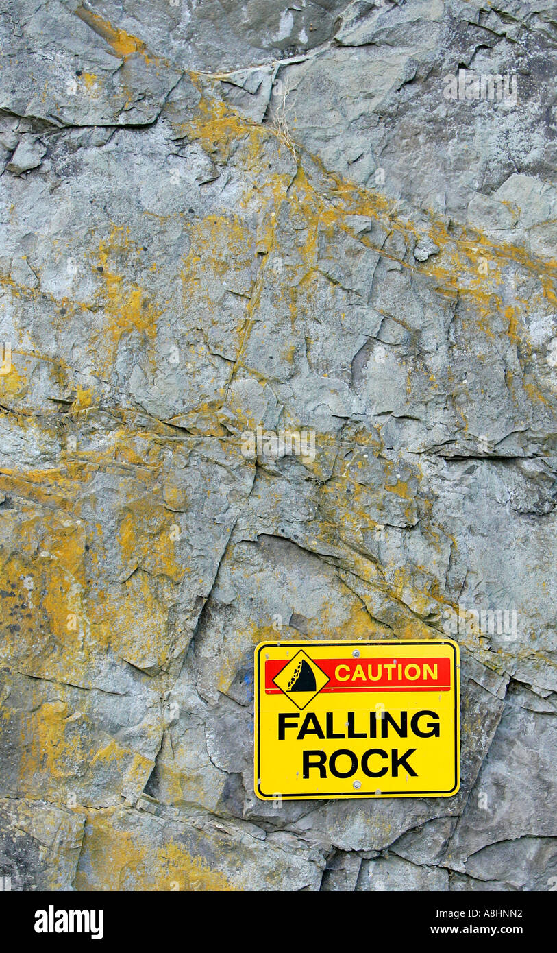 Falling Rock sign on rock face Stock Photo - Alamy