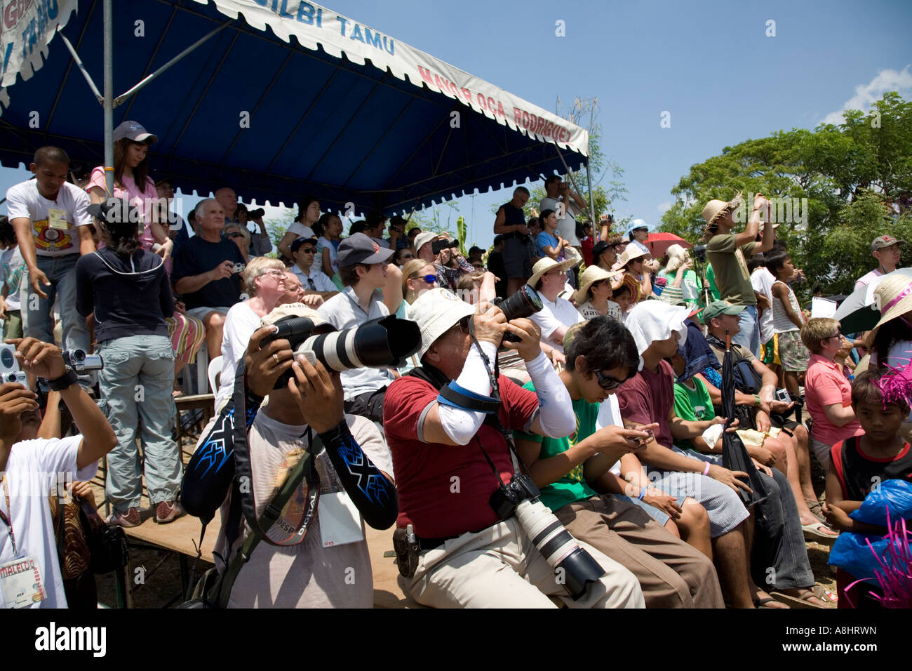 Spectators during Crucifixion of flagellants, Good Friday Lenten Rites, San Pedro Cutud, San Fernando, Philippines Stock Photo