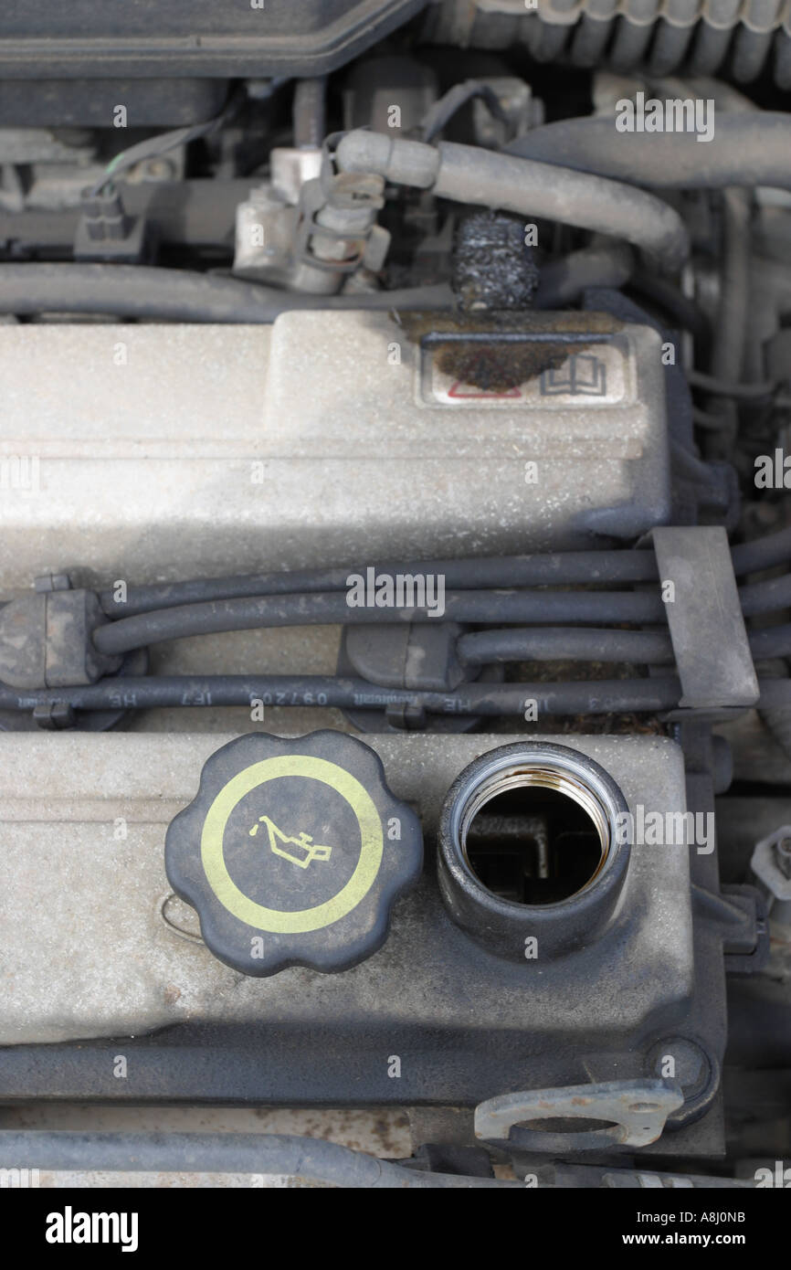 Car engine oil cap maintenance Stock Photo Alamy