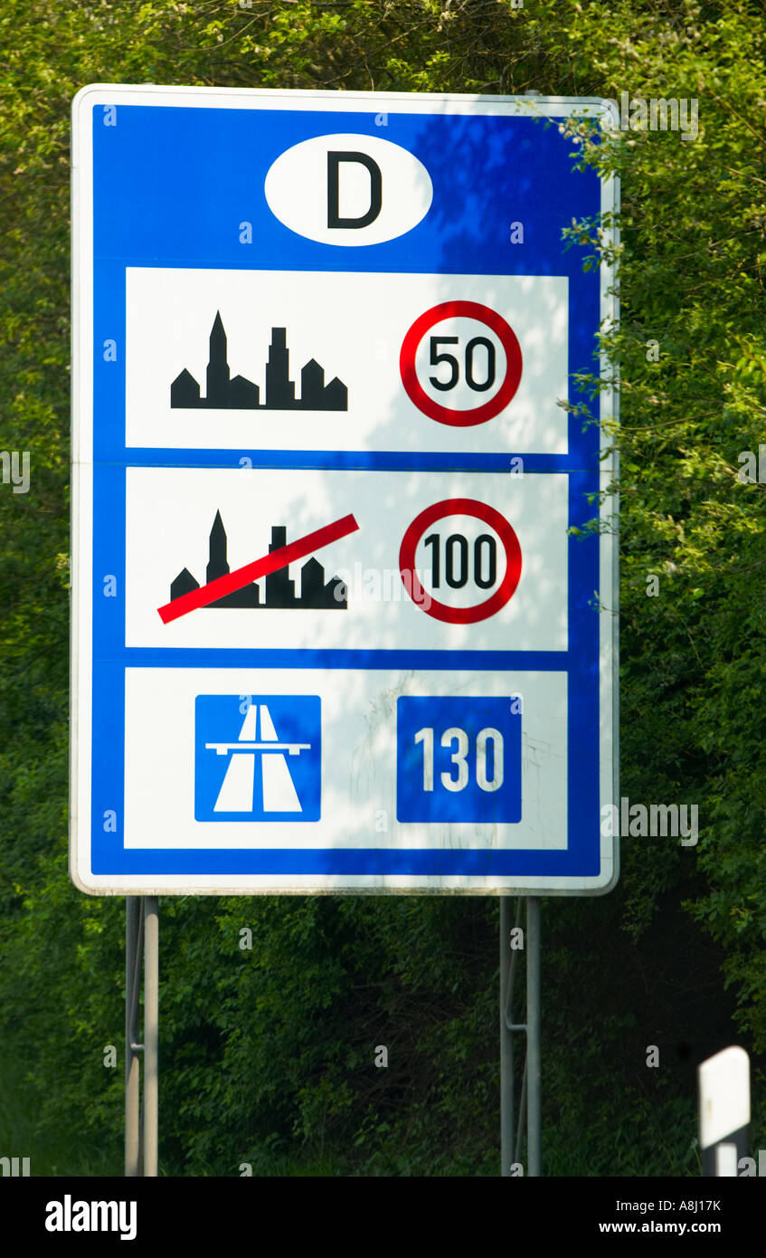 Traffic speed limit limit information sign entering Germany, Europe Stock Photo
