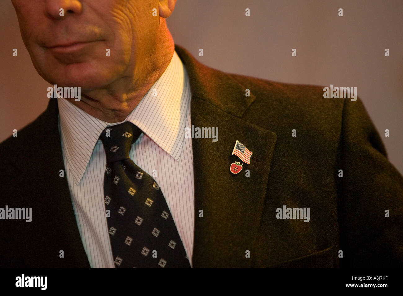 New York City Mayor Michael Bloomberg Big Apple and American lapel pins USA Feb 2006 Stock Photo