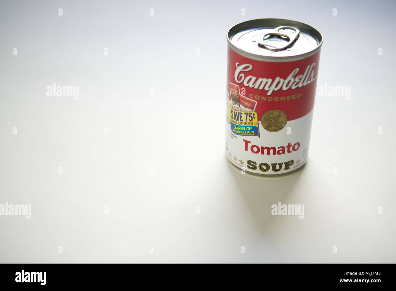 Sudio shot of a can of Campbell s tomato soup sits on a white surface background 2006 Stock Photo