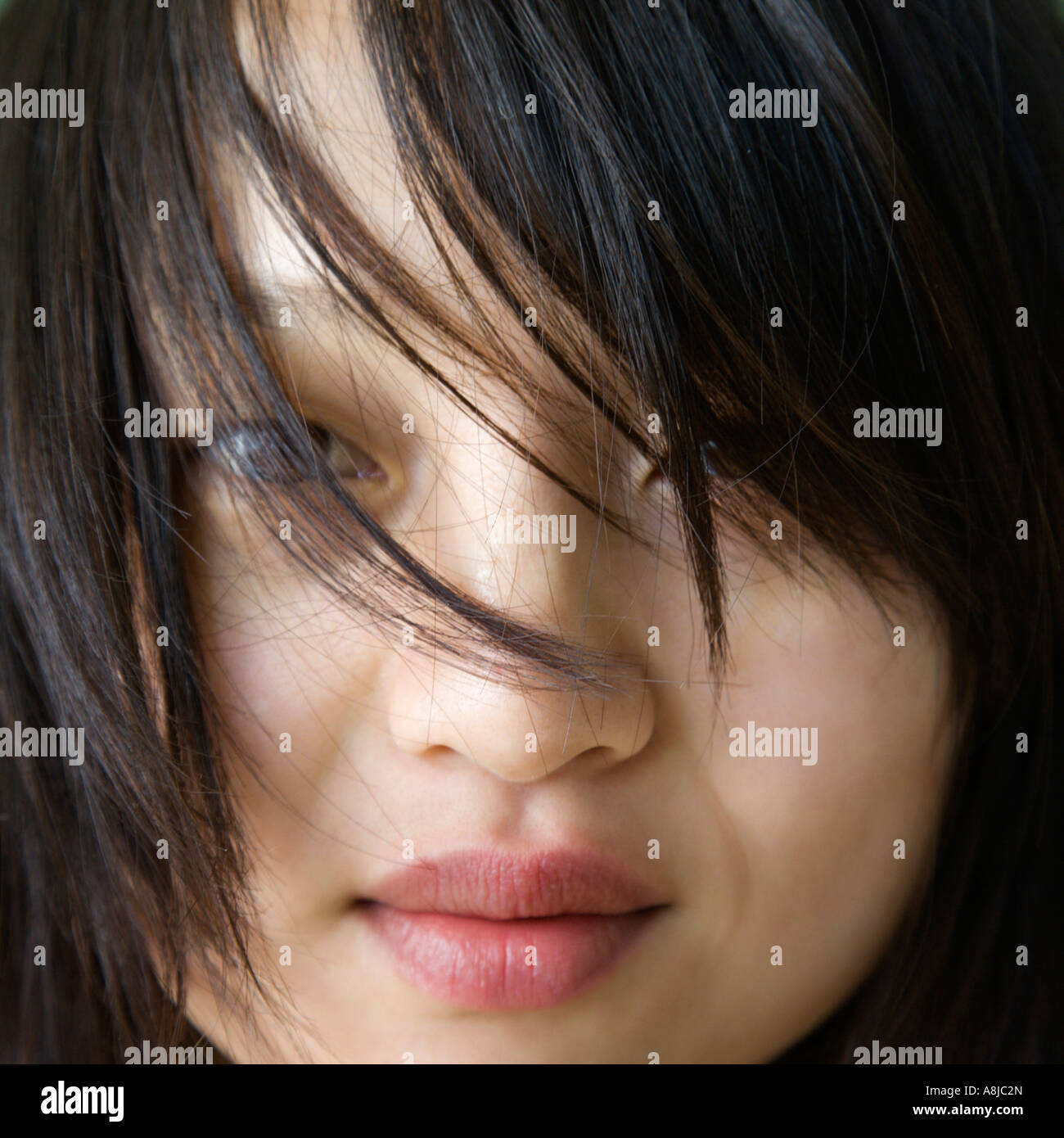 Close up portrait of pretty young Asian woman Stock Photo - Alamy