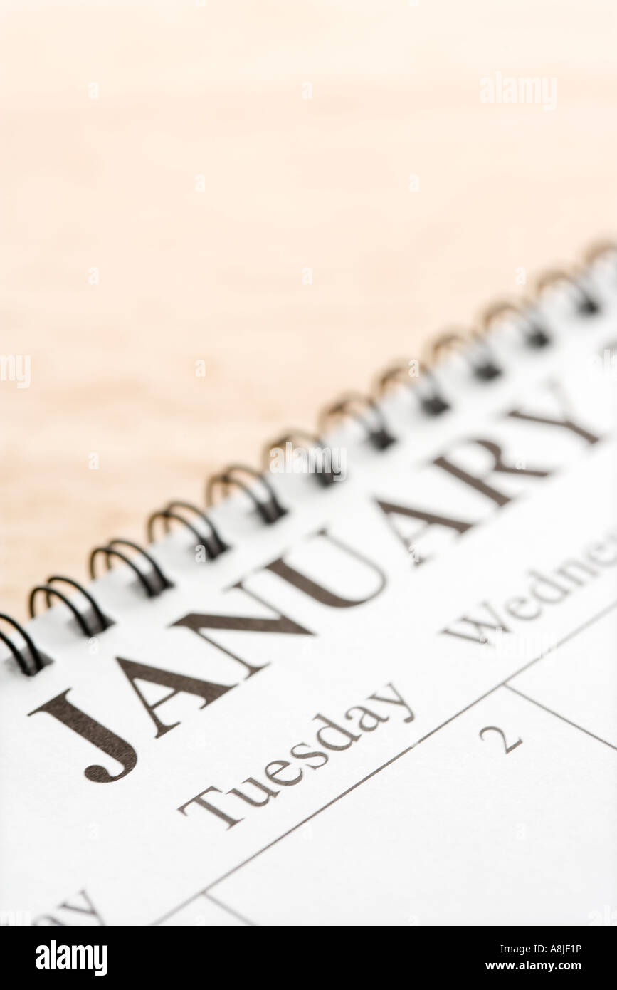 Close up of spiral bound calendar displaying month of January Stock Photo