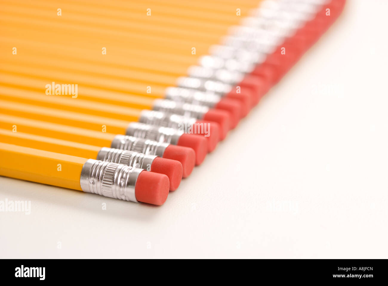 Eraser ends of group of pencils lined up in an even row Stock Photo Alamy