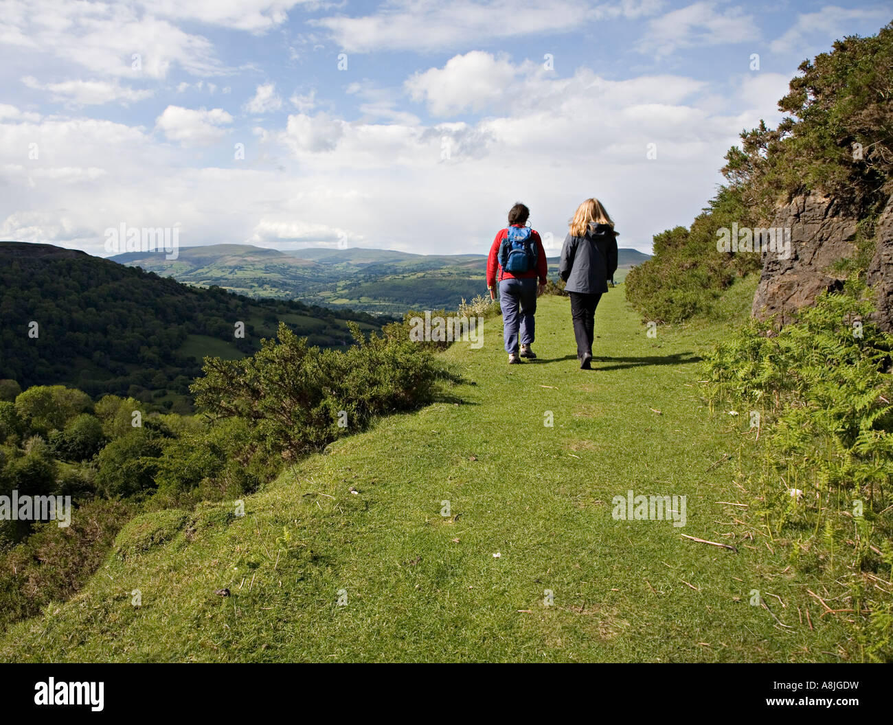 Two female walkers on old tramroad Blaenavon World Heritage Site Wales UK Stock Photo