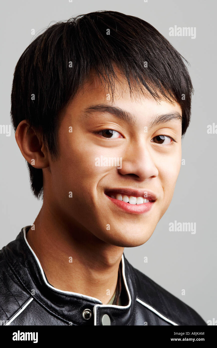 Portrait of a young man smiling Stock Photo - Alamy