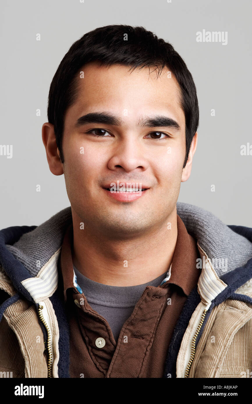 Portrait of a young man smiling Stock Photo - Alamy