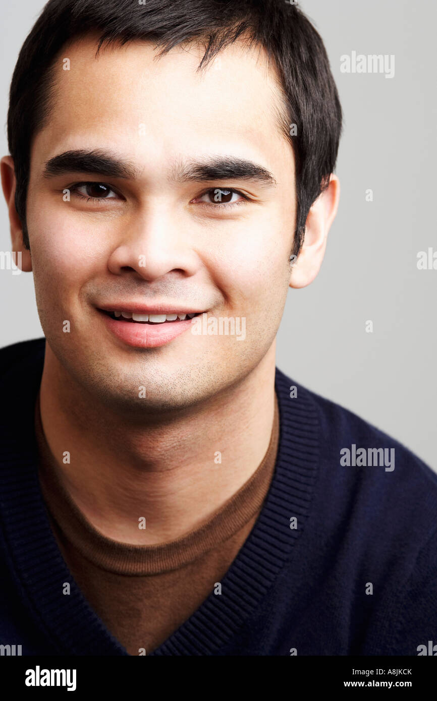 Portrait of a young man smiling Stock Photo - Alamy