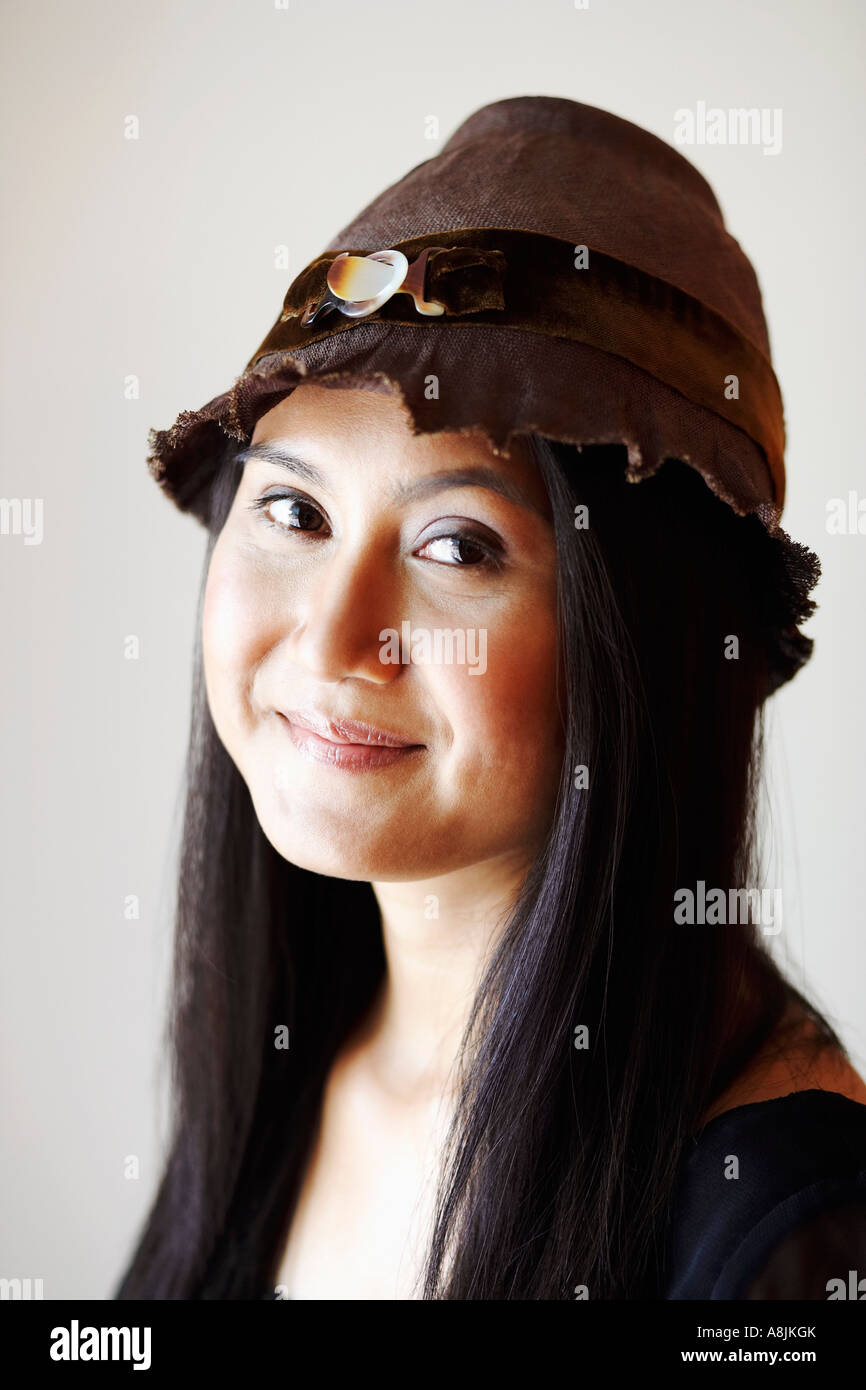 Smiling black lady in a hat hi-res stock photography and images - Alamy