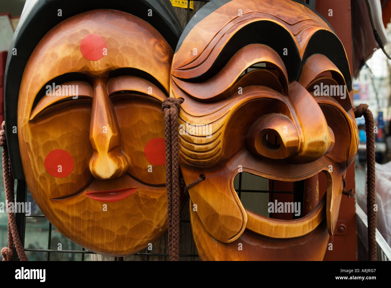 Wooden masks for sale in Insadong Market in Seoul South Korea Stock Photo