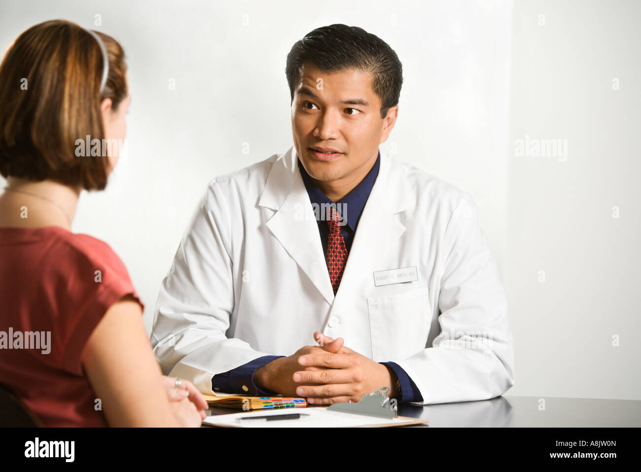 Asian female doctor patient hi-res stock photography and images - Alamy