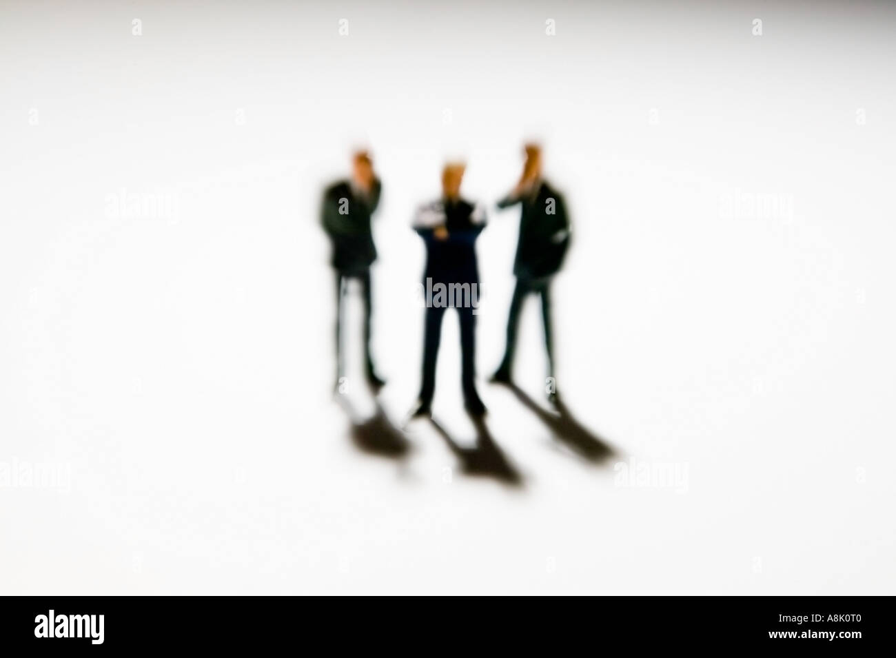 models of businessmen in group viewed from above Stock Photo