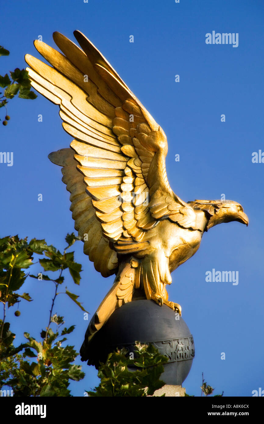 Close up of the statue of Golden Eagle with wings outstretched perched on column along the