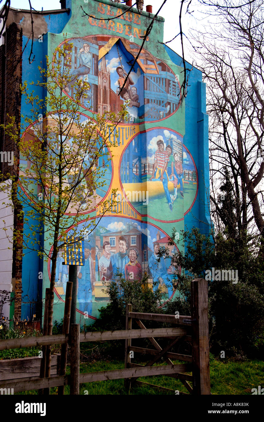 Wall mural of adventure playground on side of house by Slade Garden in Brixton South London. Stock Photo