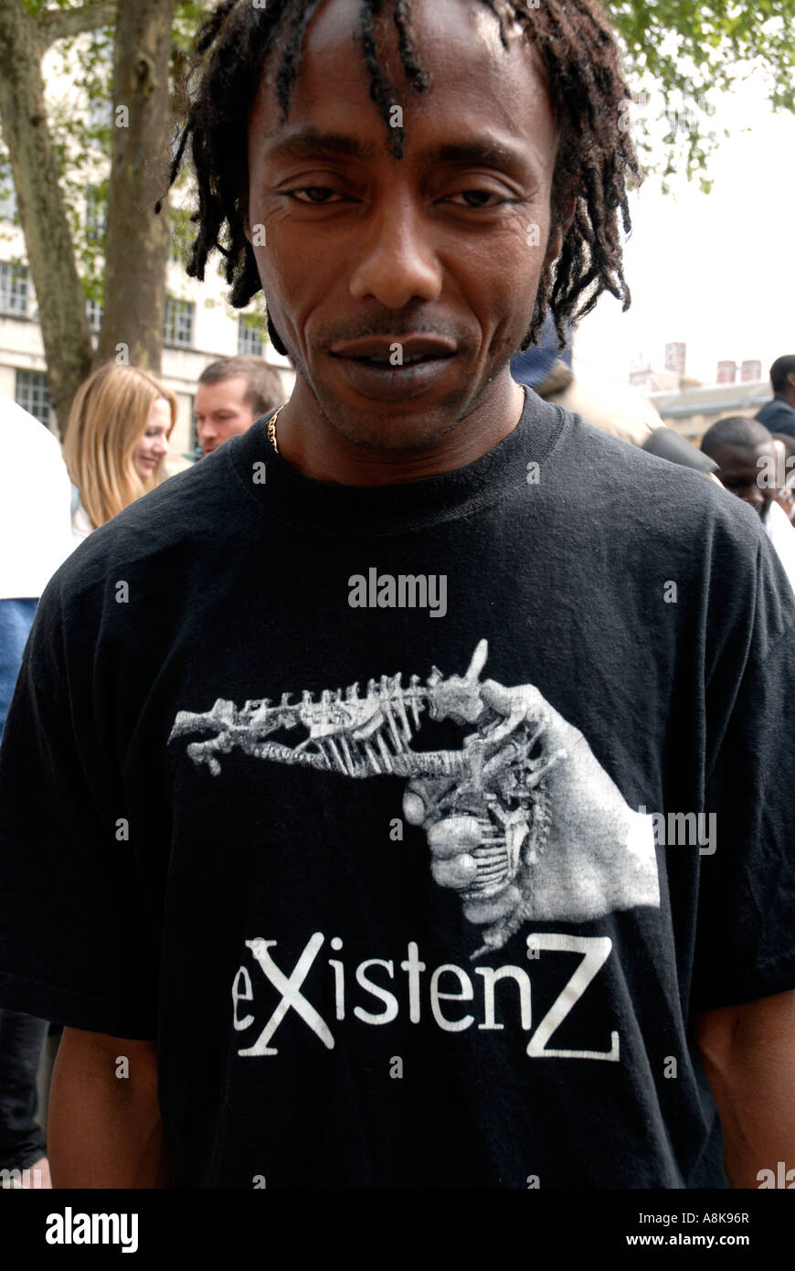 Young man at Dafur protest with tee-shirt  with gun made of skeleton Stock Photo