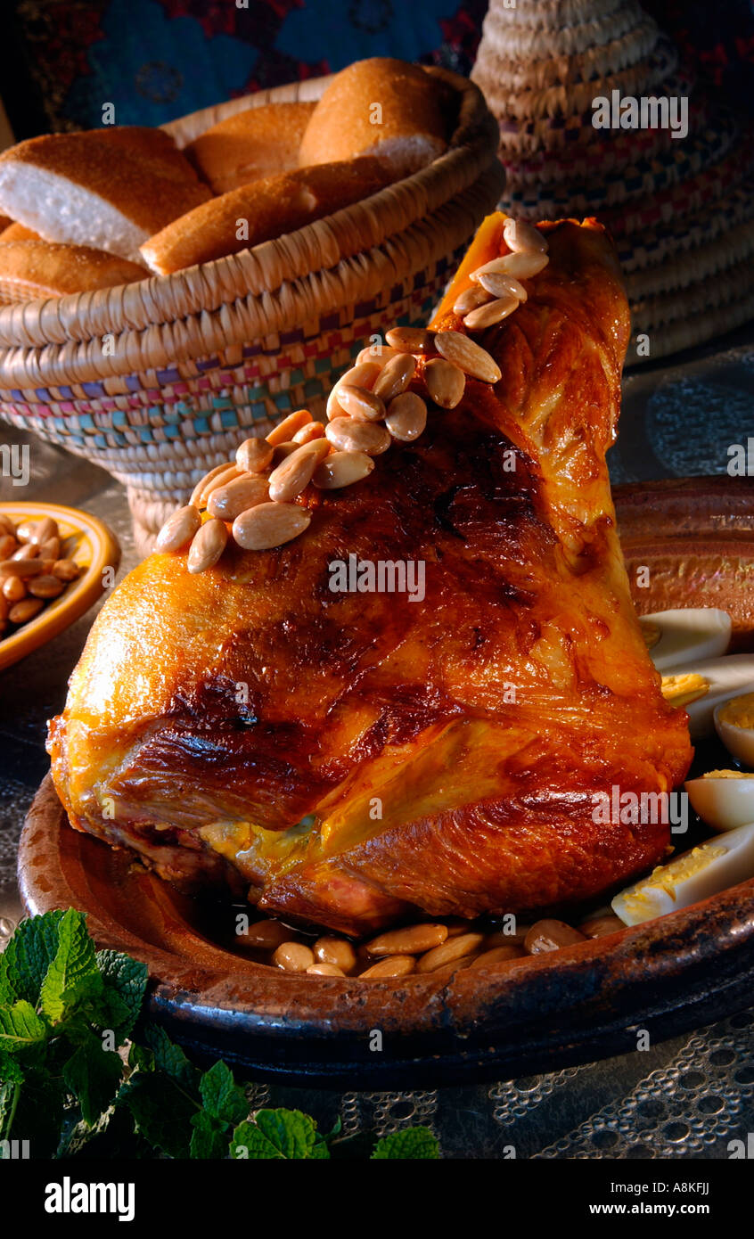 Moroccan roast leg of lamb with almonds Stock Photo Alamy