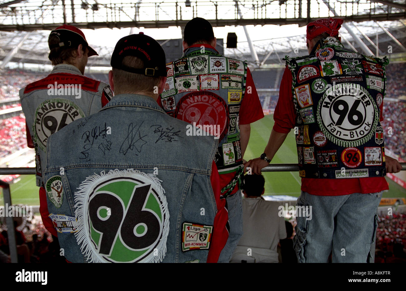 Supporters of Hannover 96 football club at the AWD Arena, Lower Saxony, Germany. Stock Photo