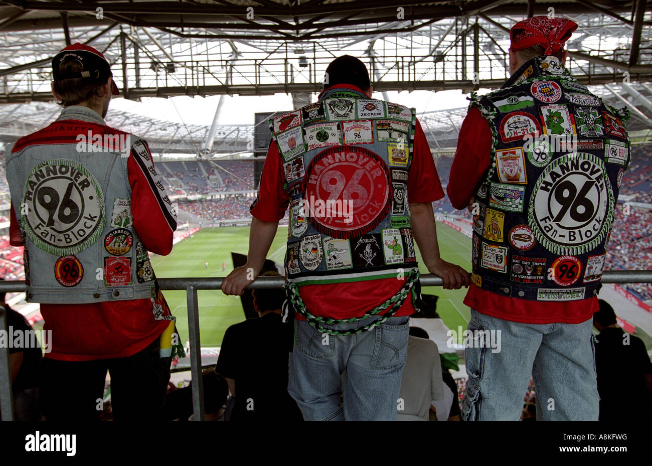 Supporters of Hannover 96 football club at the AWD Arena, Lower Saxony, Germany. Stock Photo