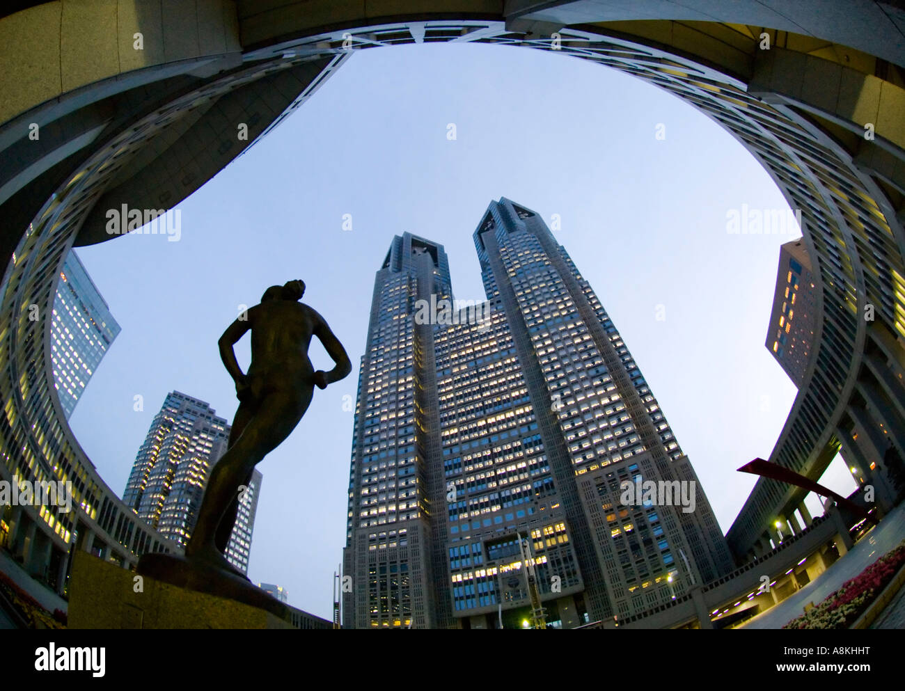 Wide angle view of sculpture and Metropolitan City Hall in Shinjuku Tokyo Stock Photo