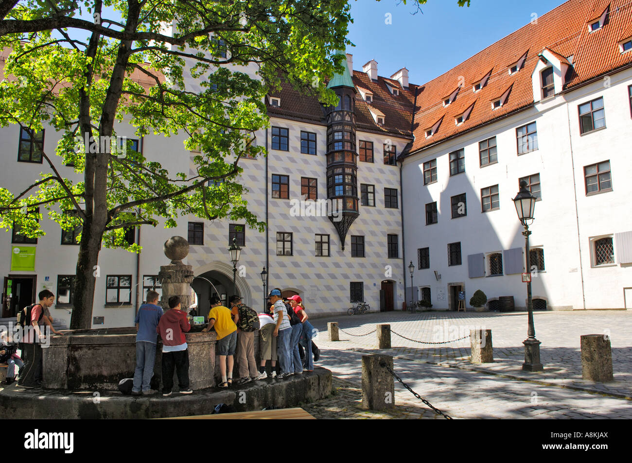 Fountain with children in the old courtyard of the Residence, Munich, Bavaria, Germany Stock Photo