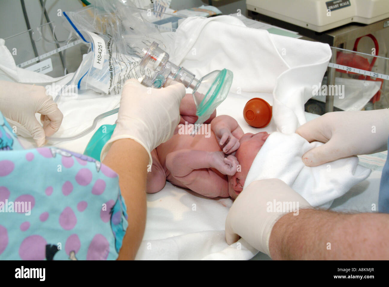 Newborn boy, Hispanic, Italian American, is cleaned, checked, inspected