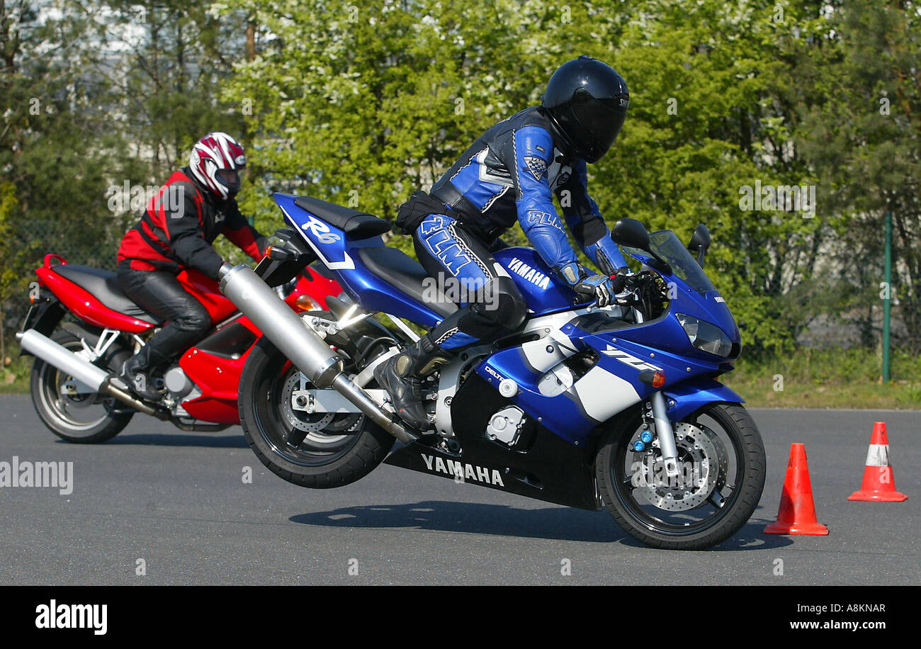 Motorcycles being tested on a practise course Stock Photo