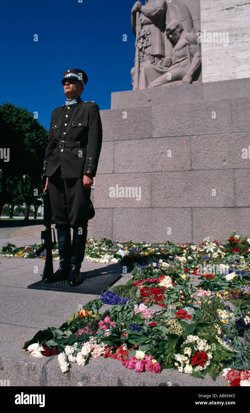 Guard at the Freedom Monument in the New Town, Riga, Latvia.  It was designed by Karlis Zale, built in 1935 and is 350m tall. Stock Photo