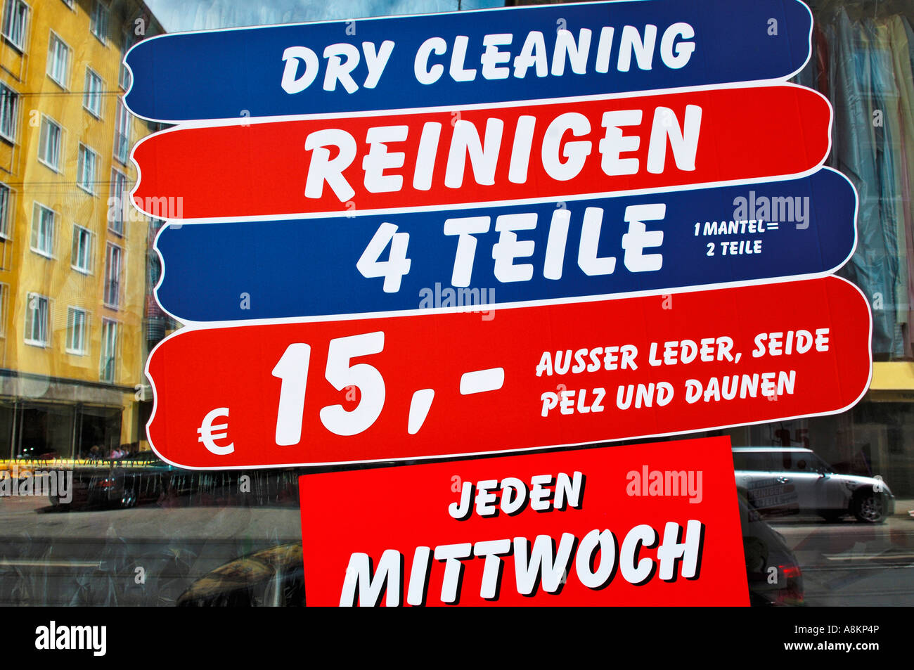 Advertising signs for drycleaning, Munich, Bavaria, Germany Stock