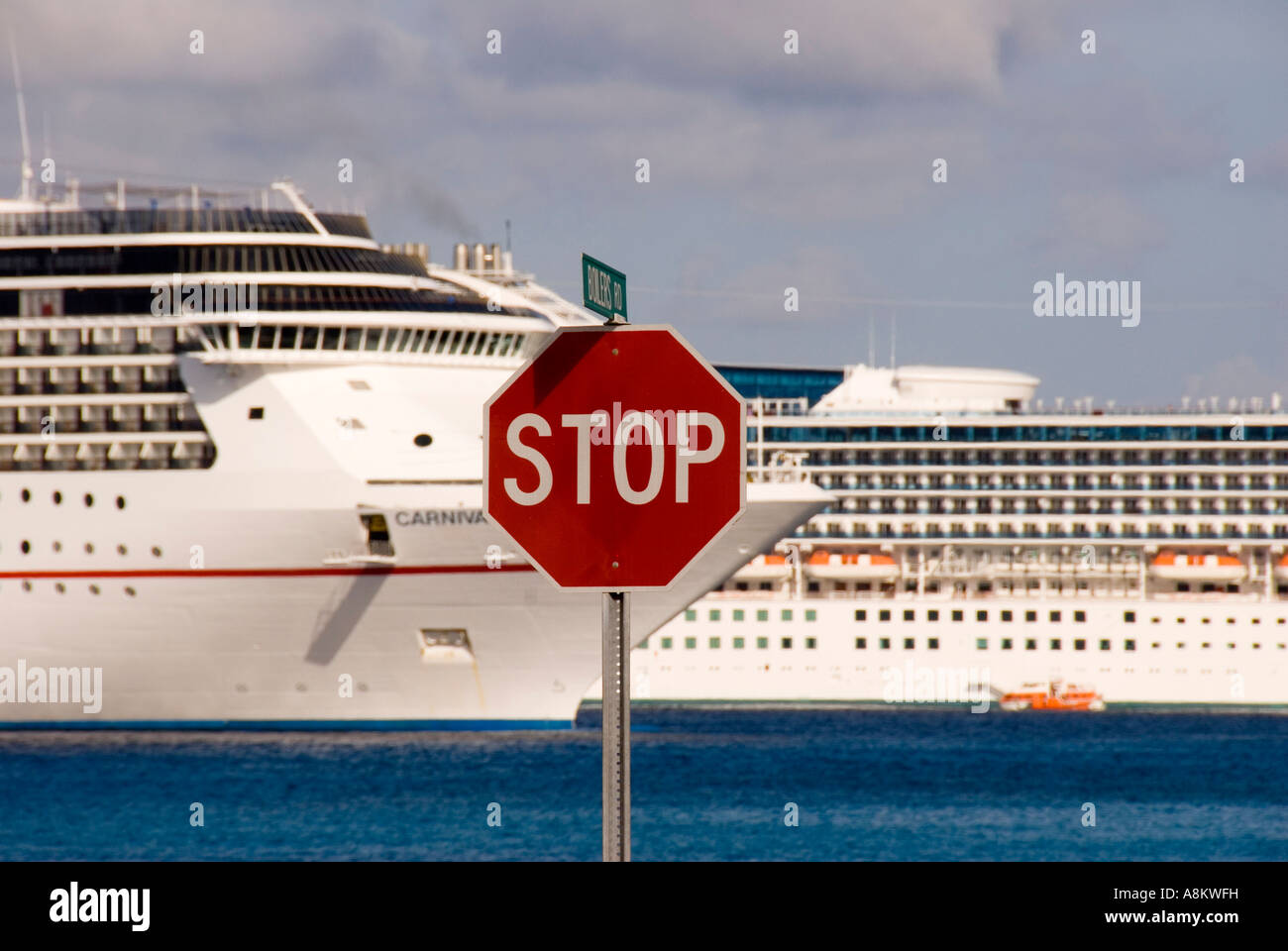 Grand Cayman George Town red stop sign irony humor Stock Photo