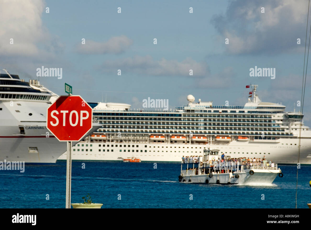 Grand Cayman George Town red stop sign irony humor ferry tender Stock Photo