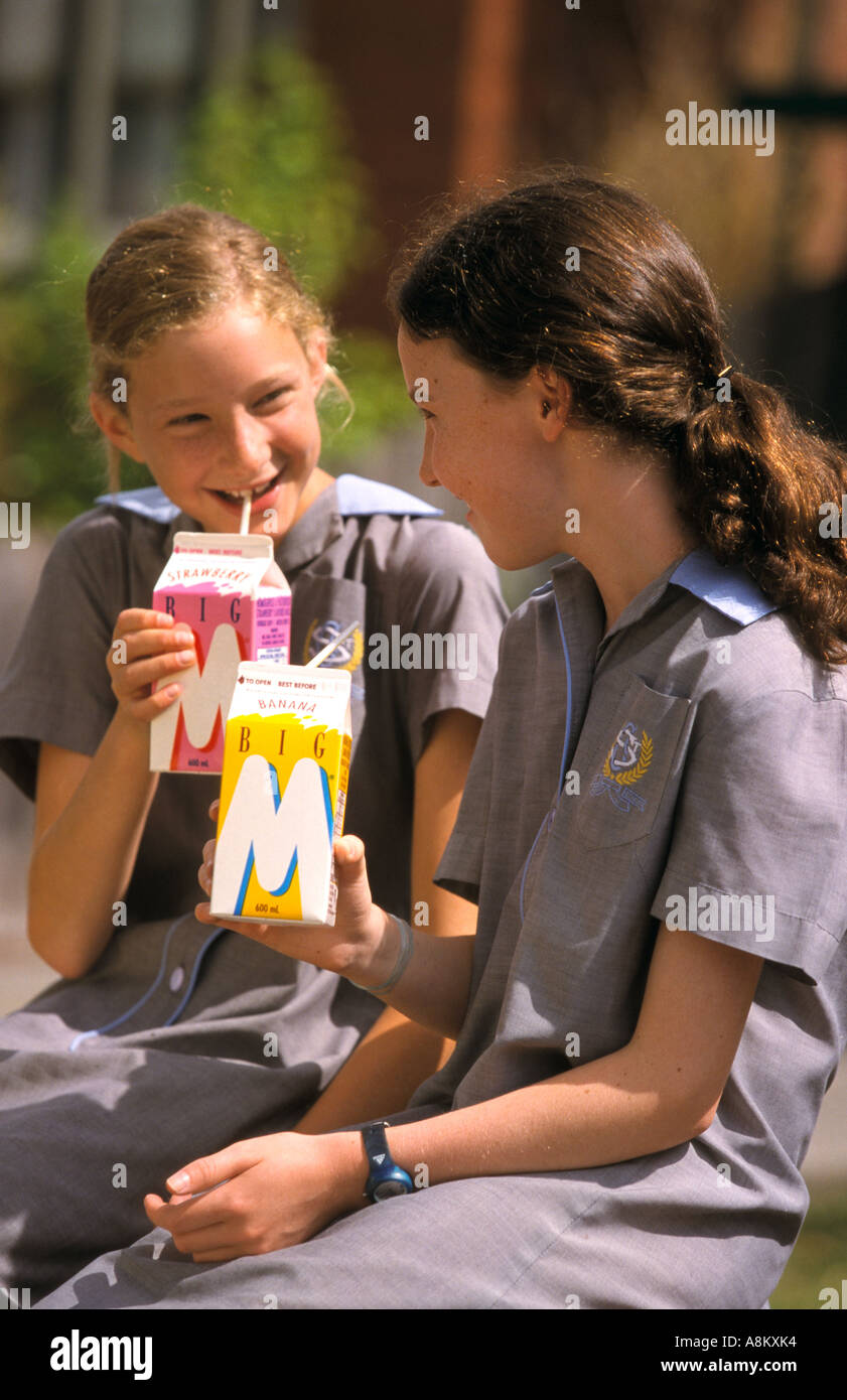 Young girls drinking flavoured milk Melbourne Victoria Australia