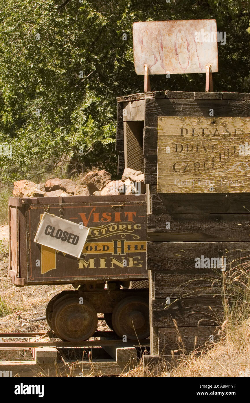 IDAHO MAIN SALMON RIVER Old mining car parked in front of mining tunnel