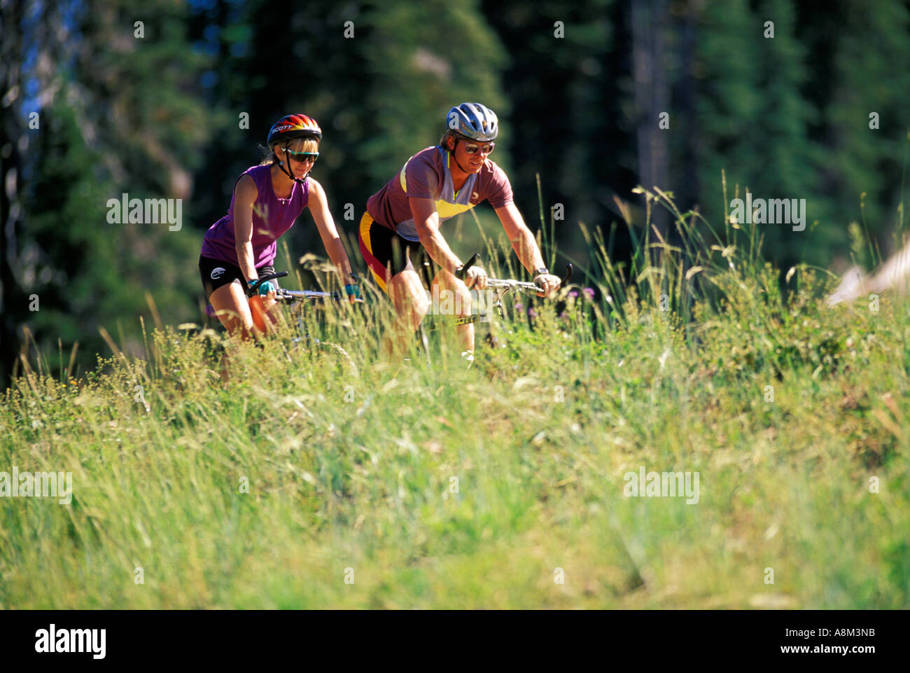 Couple mountain biking in the spring in Boise, Idaho Stock Photo