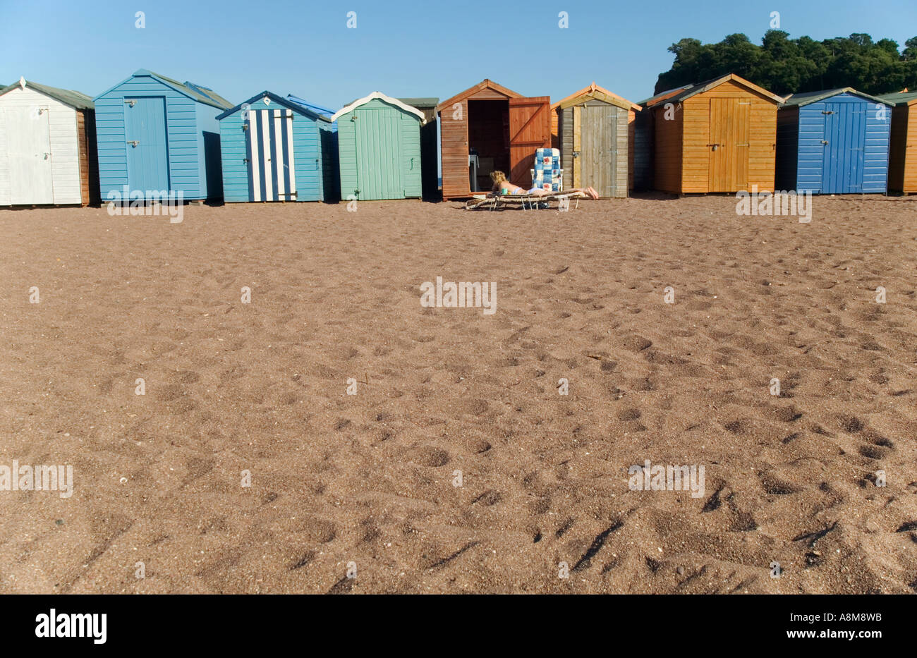 Beach huts on the Back Beach inside the estuary of the River Teign