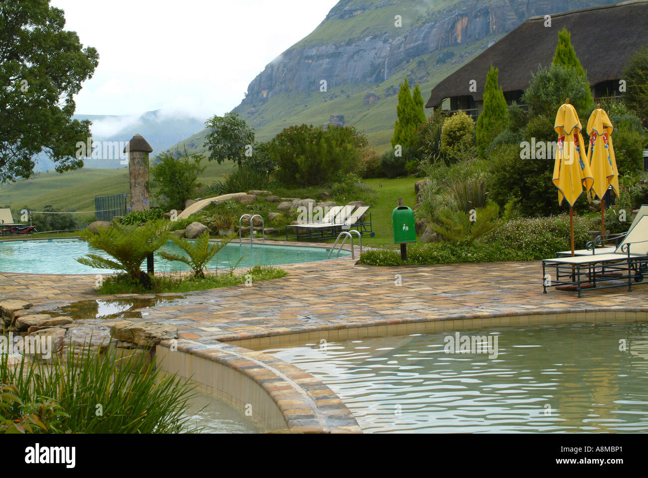 The Beautiful Swimming Pools at Cathedral Peak Hotel Drakensberg Mountains Natal South Africa Stock Photo