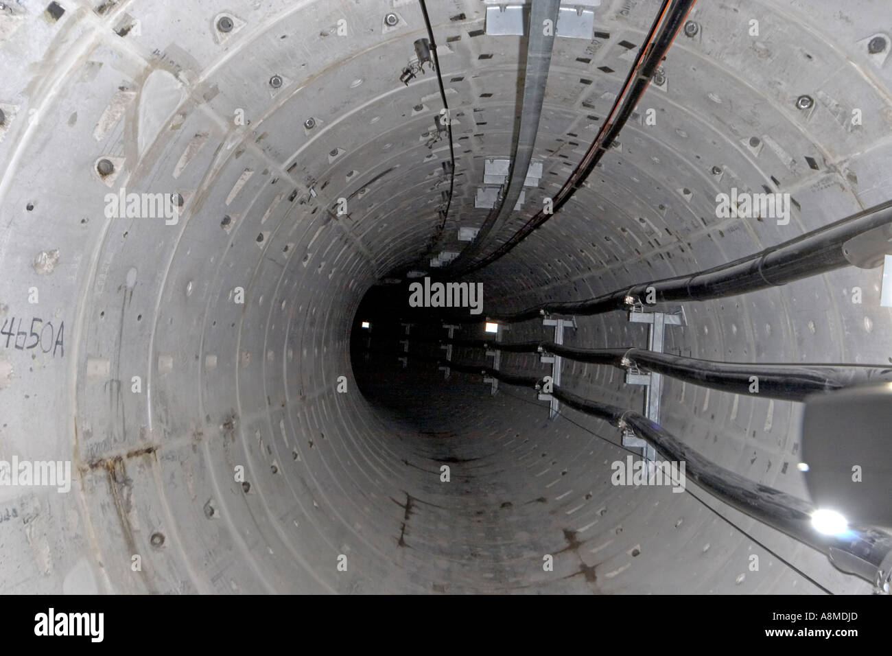 Deep underground electricity transmission tunnel England UK Stock Photo