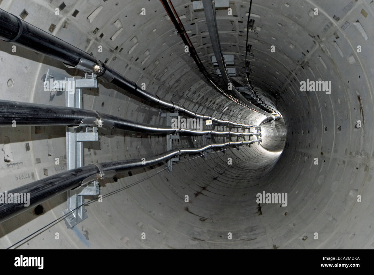Deep underground electricity transmission tunnel England UK Stock Photo