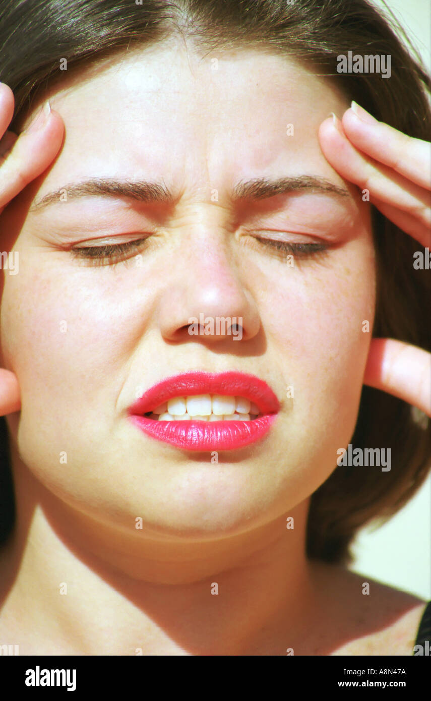 Woman with headache Stock Photo Alamy