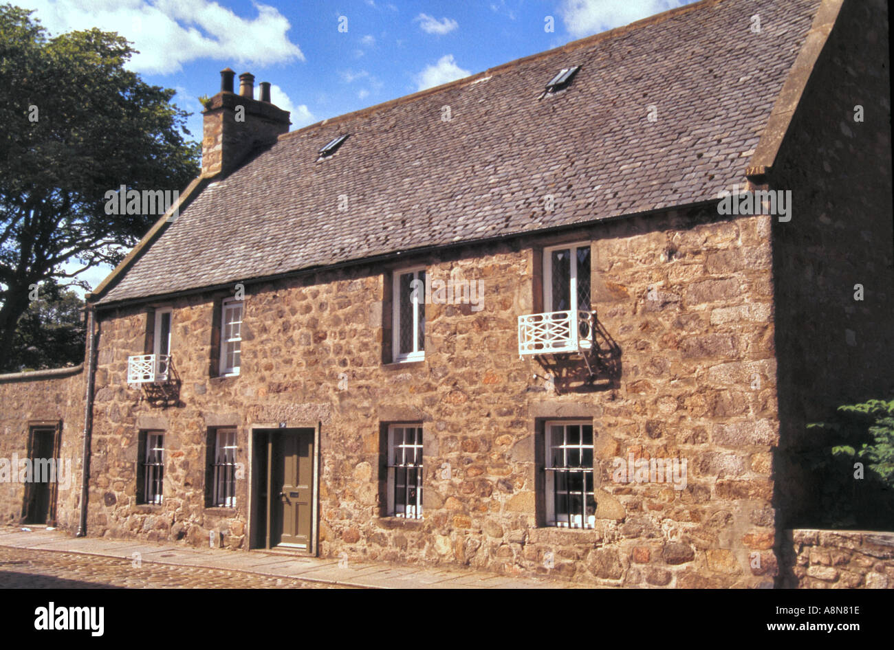Old 17th and 18th century buildings along the cobblestone streets of Old Aberdeen Scotland  Stock Photo