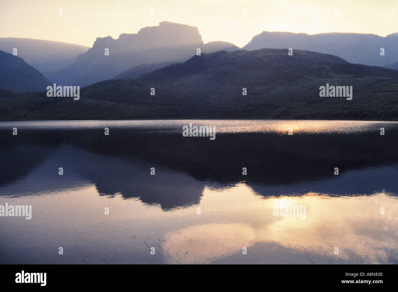 Sunset over a lough lake on the Isle of Skye Scotland Stock Photo