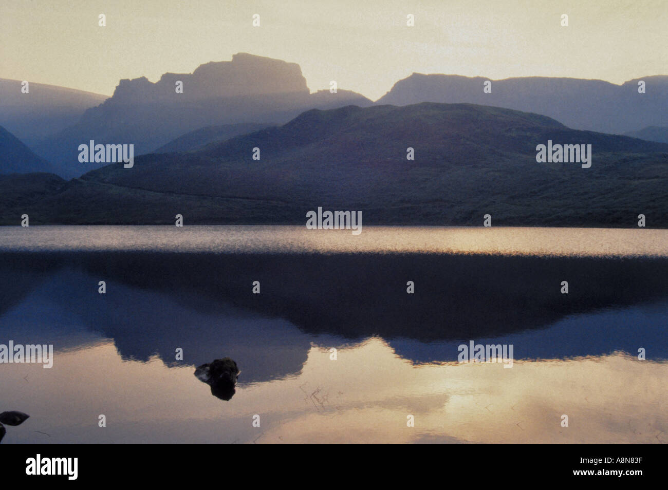 Sunset over a lough lake on the Isle of Skye Scotland Stock Photo