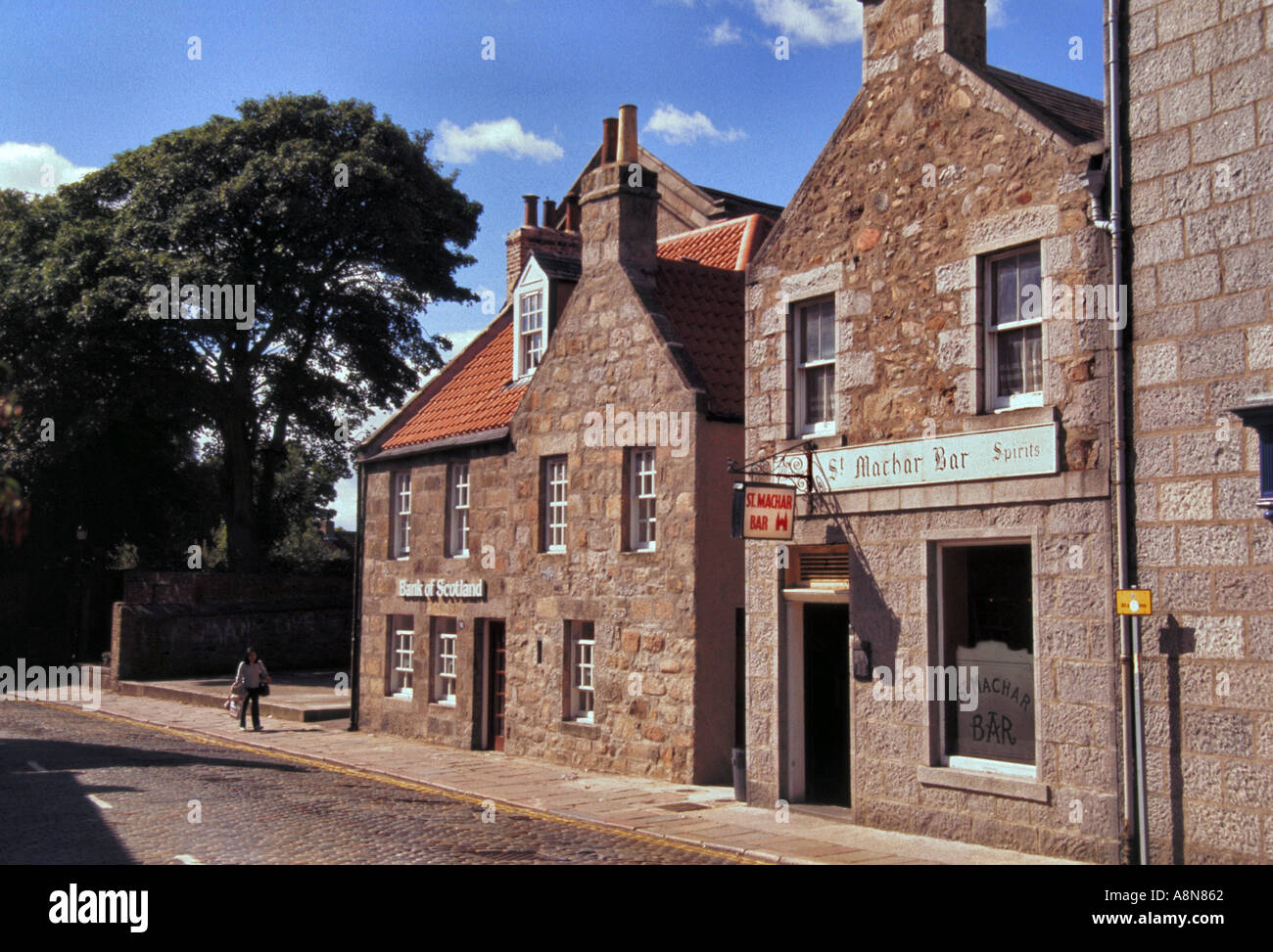 Old 17th and 18th century buildings including a small pub along the cobblestone streets of Old Aberdeen Scotland  Stock Photo
