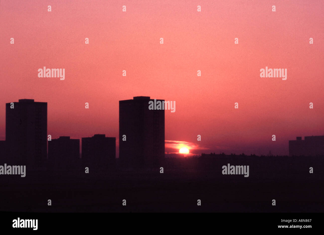 Sunset over tower blocks near the shore in Aberdeen Scotland Stock Photo