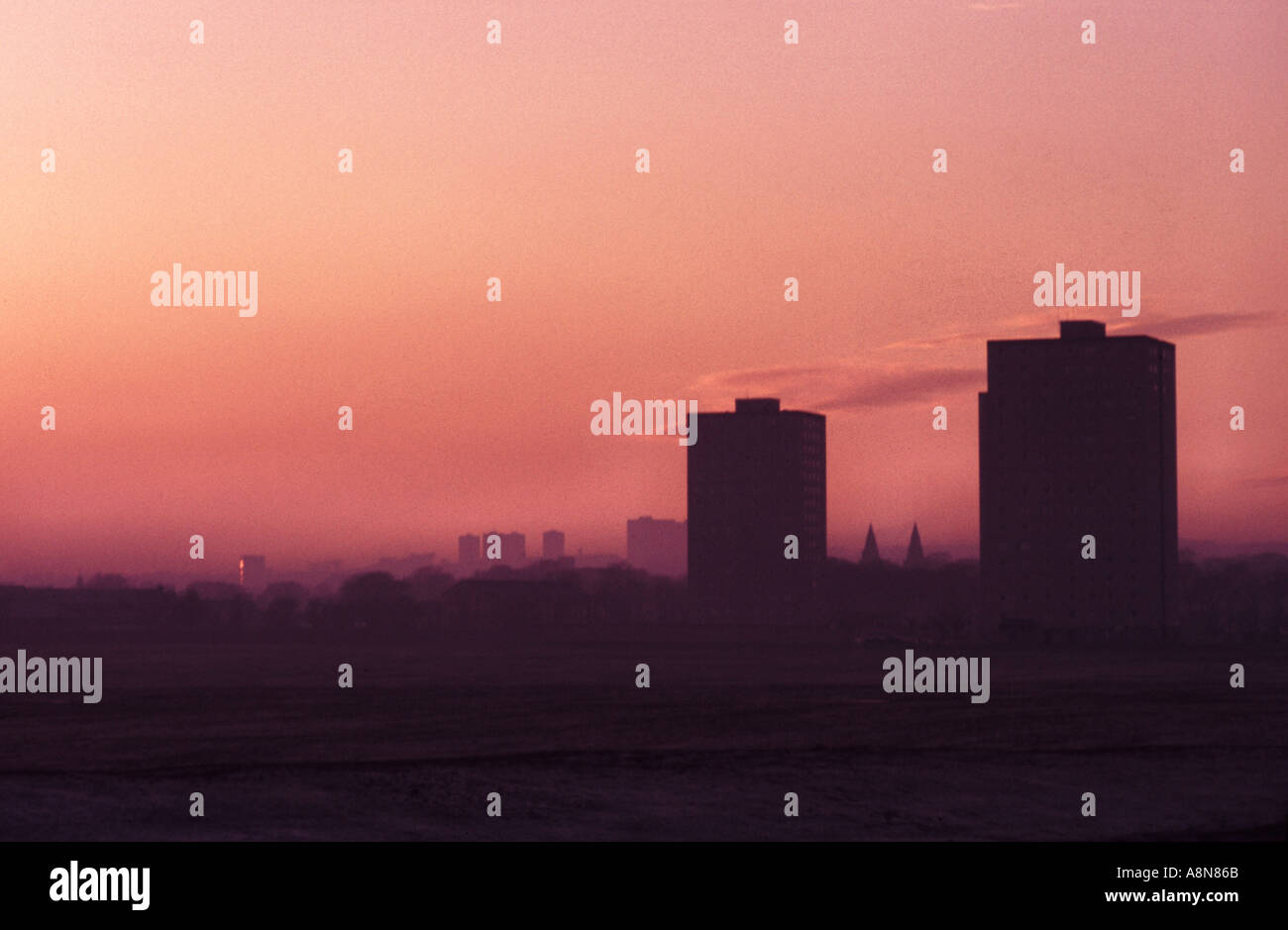 Sunset over tower blocks near the shore in Aberdeen Scotland Stock Photo