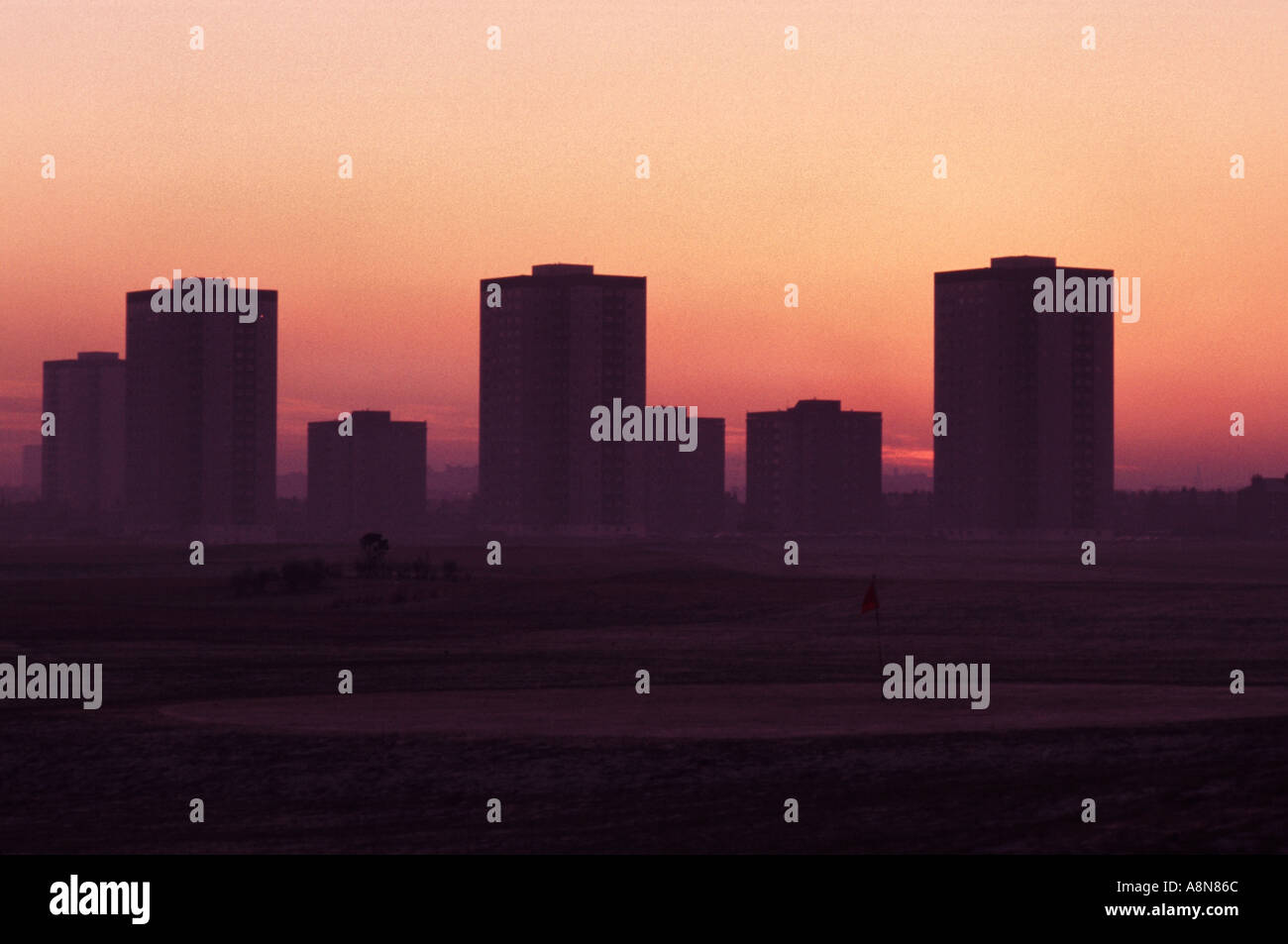 Sunset over tower blocks near the shore in Aberdeen Scotland Stock Photo