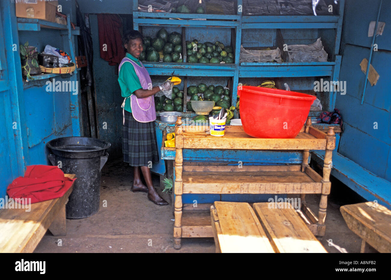 AFRICA KENYA Nairobi Small fruit stall restaurant selling only mangoes and bananas in the City Market of Nairobi Stock Photo