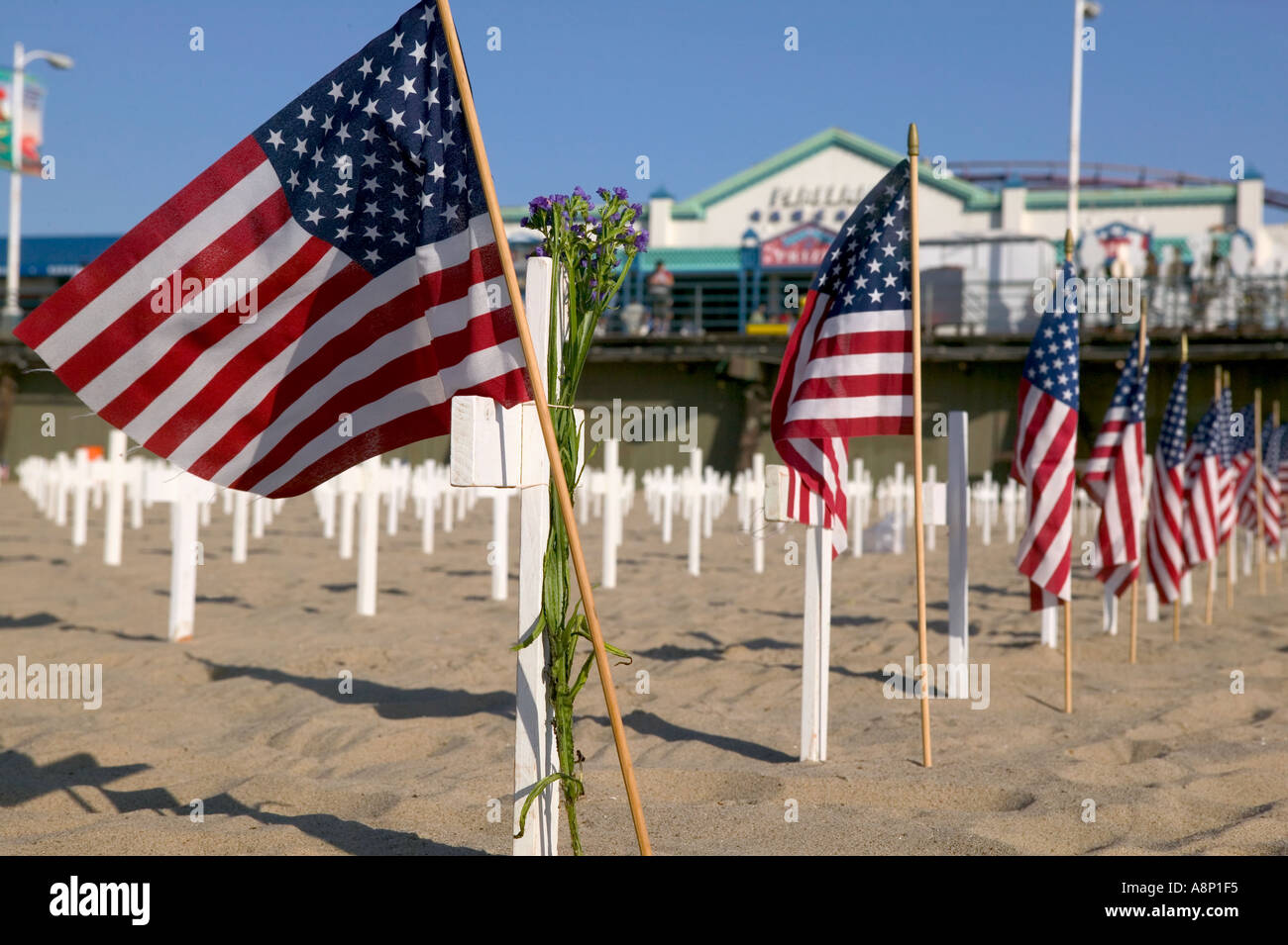 Flag and cross tribute to 1000 fallen soldiers in Iraq Santa Monica CA Stock Photo