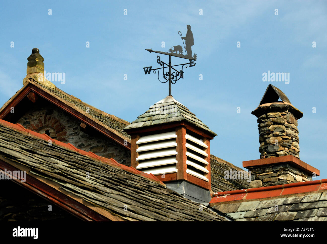 Shepherd and sheepdog weathervane on house roof. Shap Road, Skelsmergh