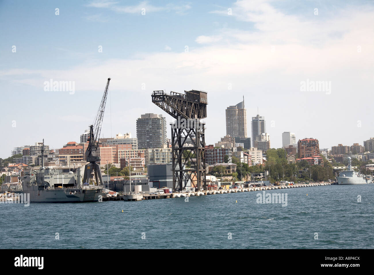 Potts Point and Woolloomooloo bay Garden Island RAN Naval base dock with warships and cranes in Sydney New South Wales NSW Stock Photo